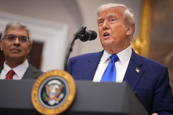Trump at a podium.
