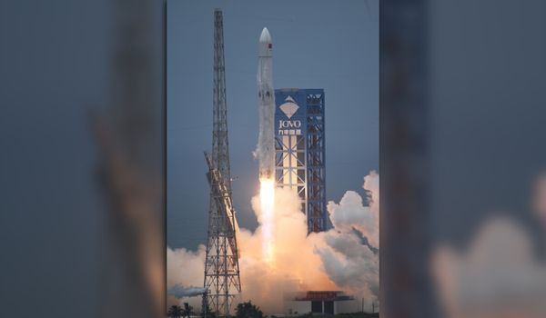 A Long March 10B rocket lifts disconnected from a motorboat pad.