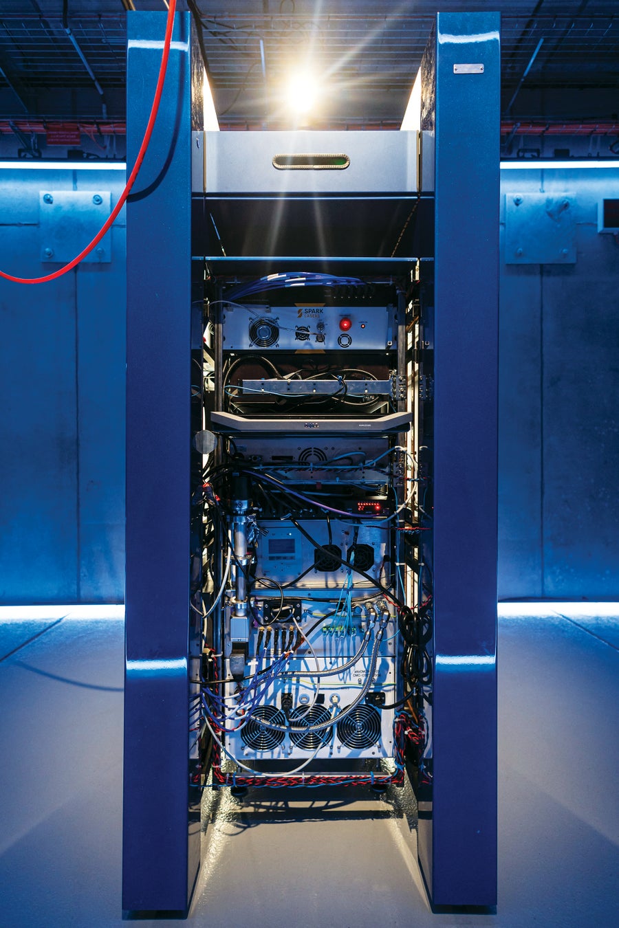 A tall stack of boxes and wires for a quantum computer.