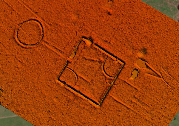 Square and circular geometric forms on an orange background.