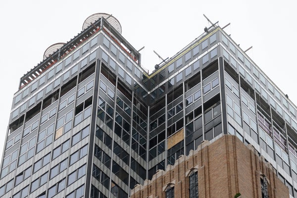 A Manhattan skyscraper under construction and showing signs of damage