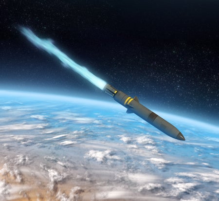 Intercontinental missile in earth orbit with blue thrusters flame