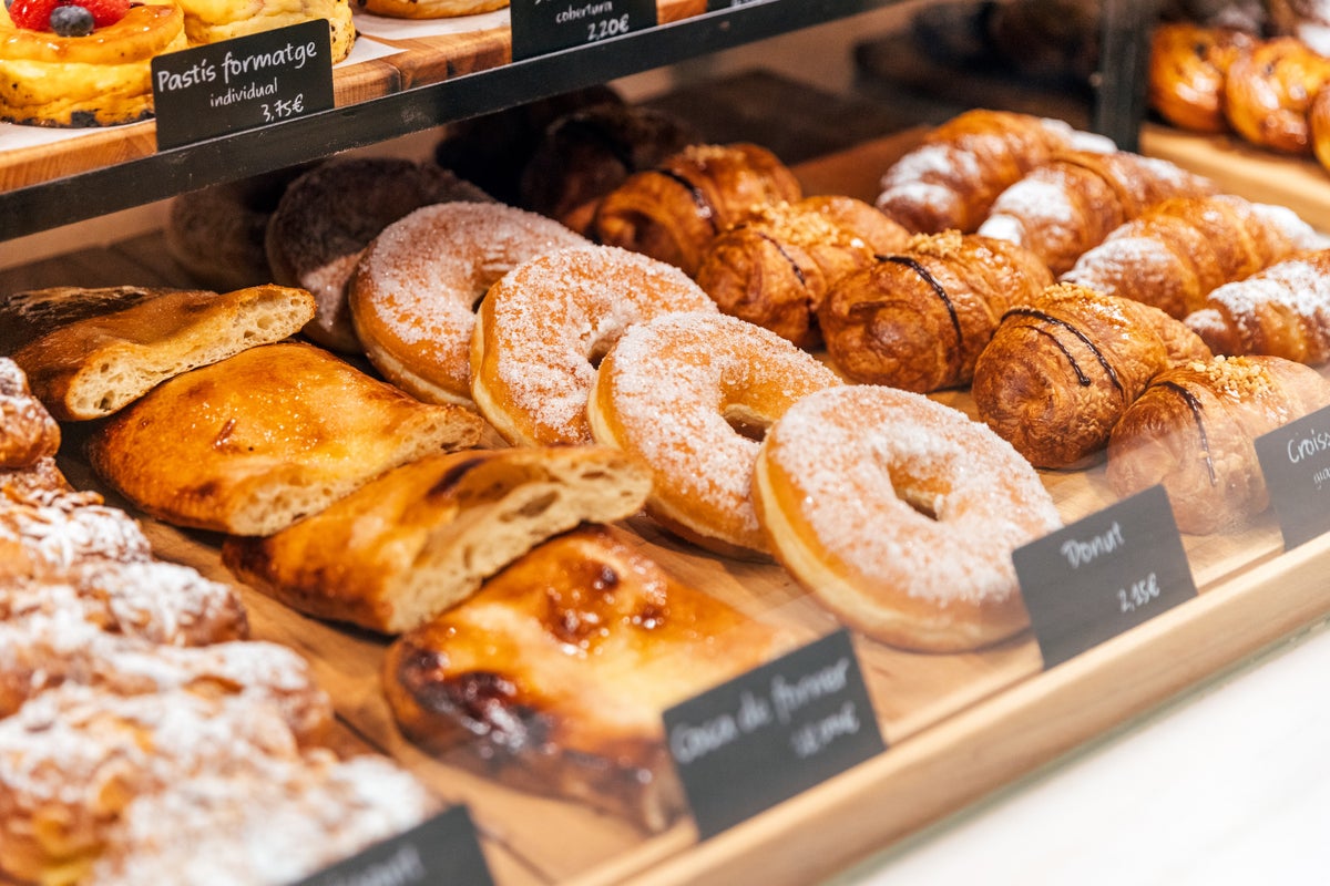 Fresh sweet pastries on a display in bakery