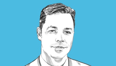 Portrait of Joseph McCullen against a blue background