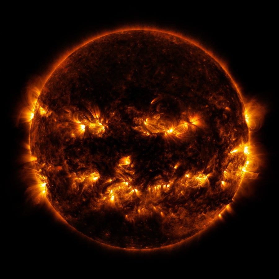 Active regions on the Sun combined to look something like a jack-o-lantern’s face on Oct. 8, 2014