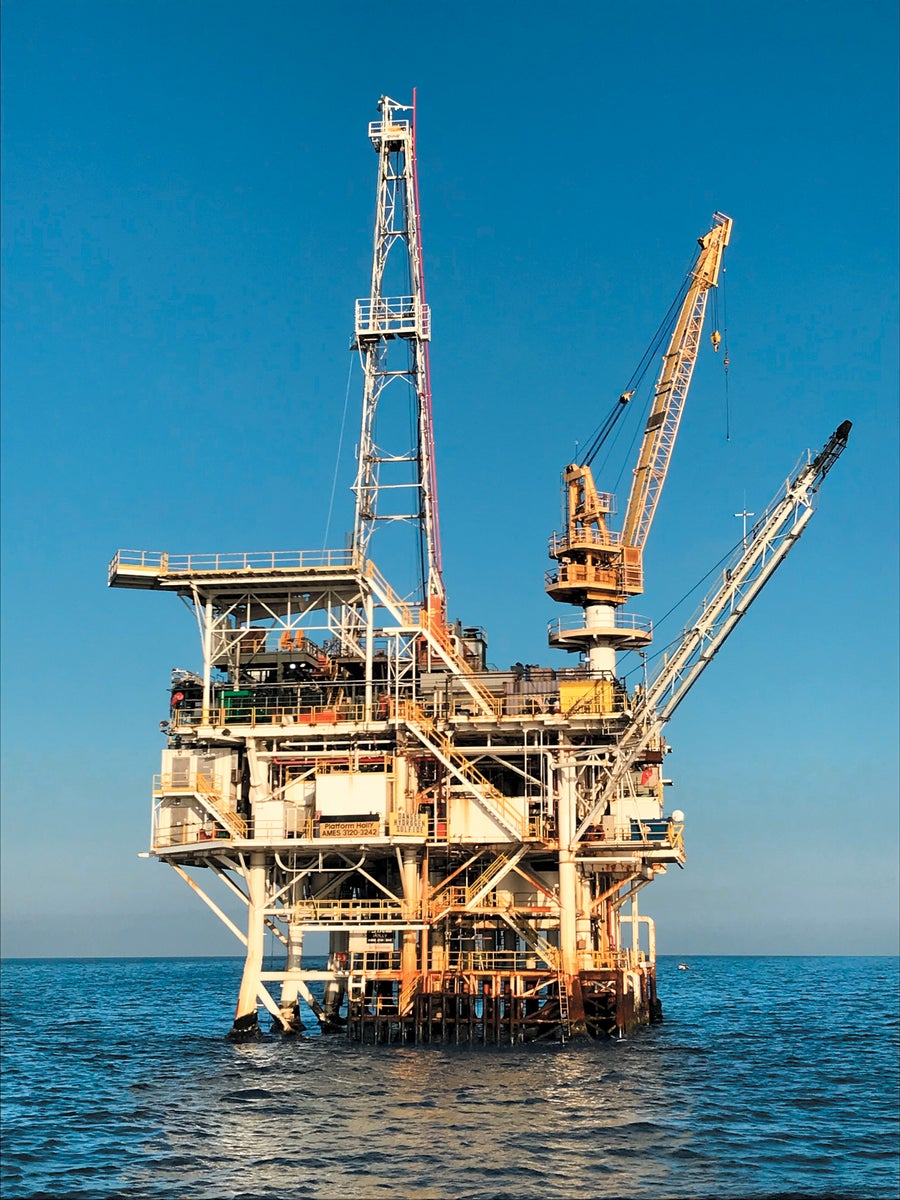 A platform standing in the ocean 