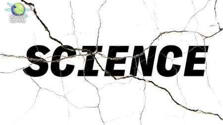 The word "science" on a cracked surface.