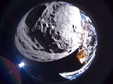 Intuitive Machines’ Odysseus lunar lander captures a round, wide field of view image, with heavy distortion from a fisheye lens, of Schomberger crater near the spacecraft's landing site on the moon.