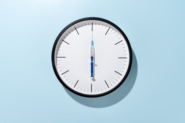 Syringe as Clock Hand on Clock Face