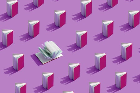 Open book surrounded by closed books with purple covers on a purple background, representing the power of knowledge and the importance of reading