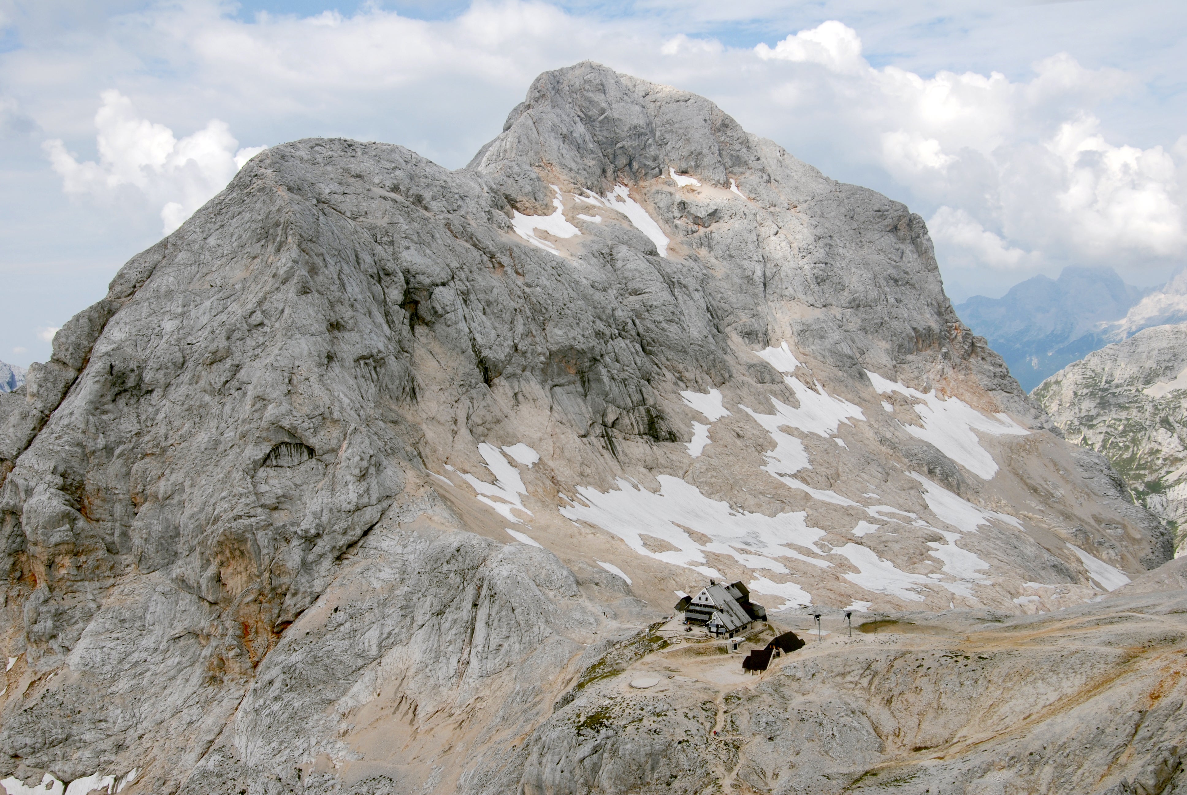 Aerial photograph of the summit of Triglav, Slovenia. The Triglav Lodge at Kredarica is seen right of center towards the lower edge of the image frame