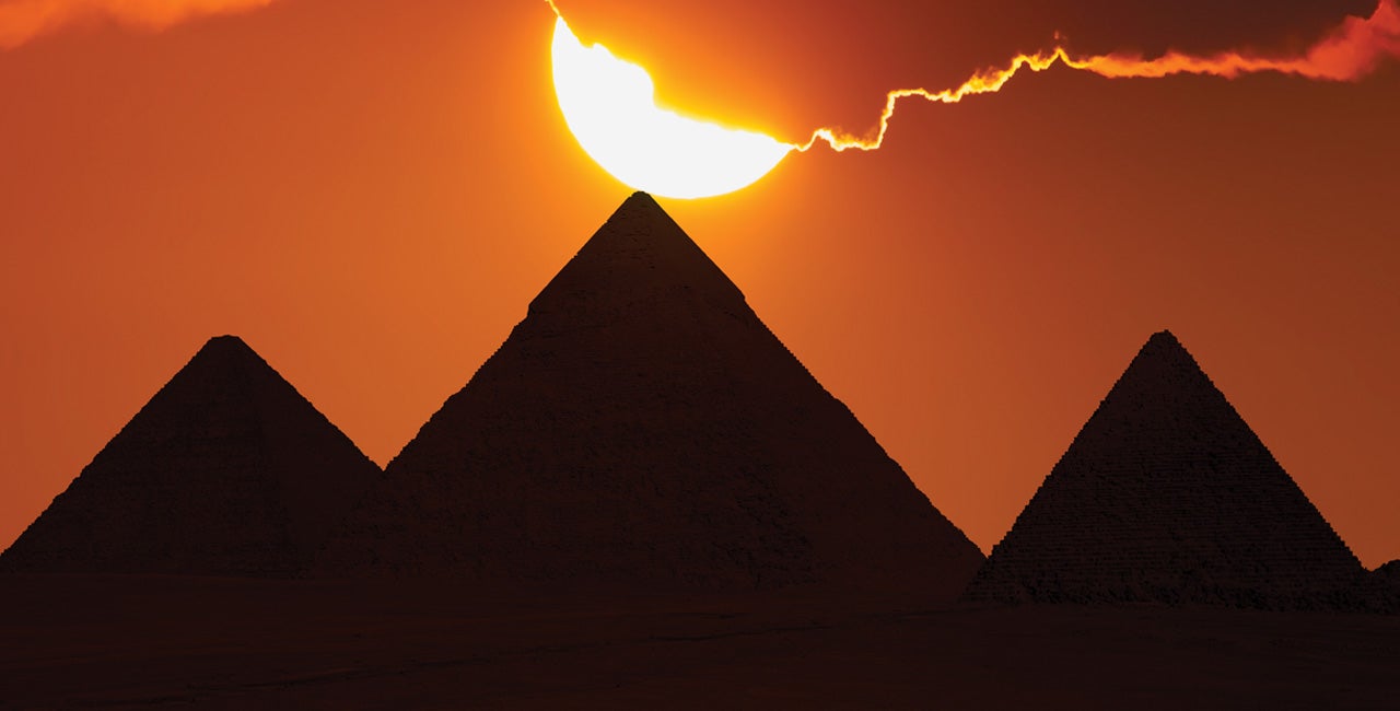 Solar Eclipse over Egyptian pyramids