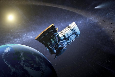 This artist concept shows the NASA WISE spacecraft, in its orbit around Earth