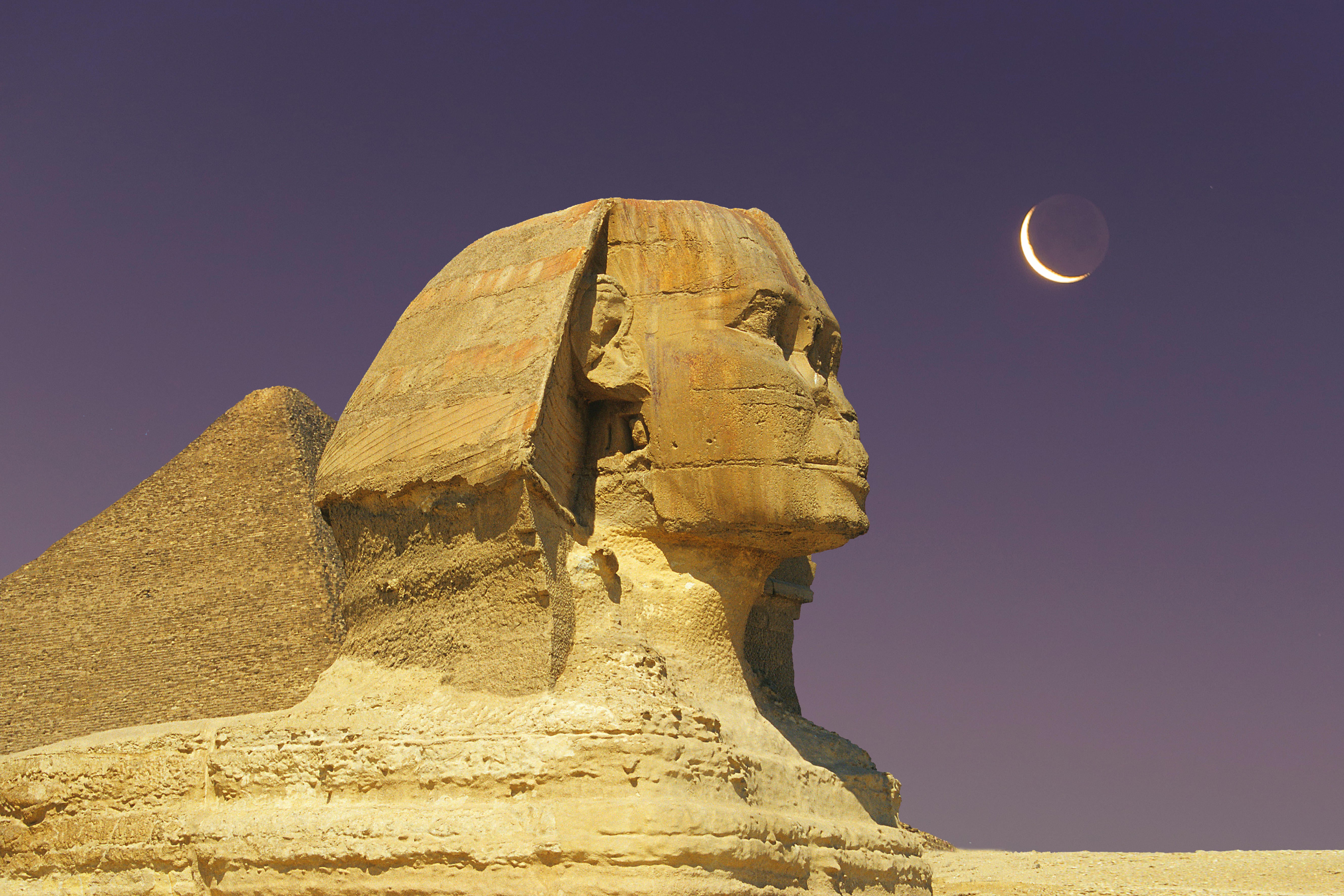 Sphinx in Egypt with crescent moon in sky