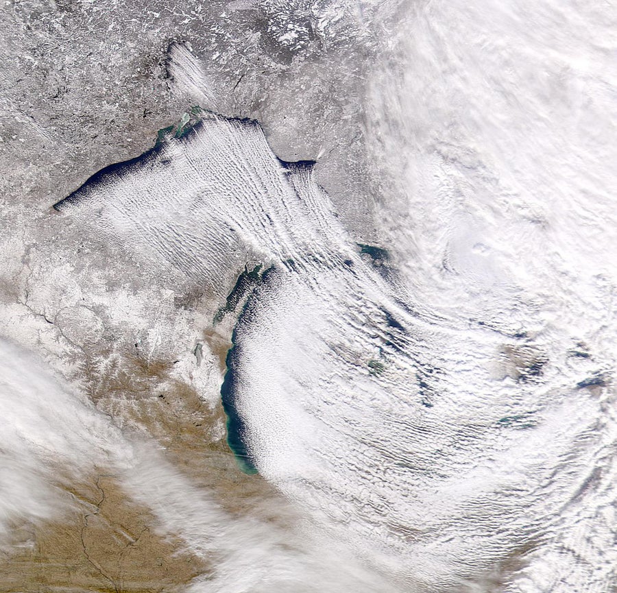 Aerial of lake effect snow on earth.