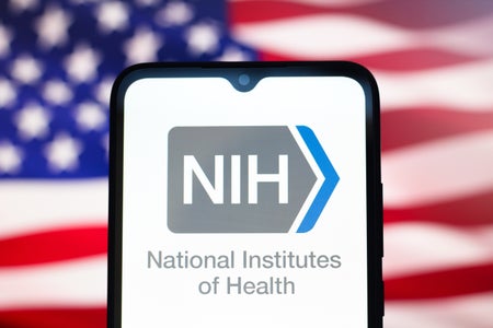 Alt	In this photo illustration, the National Institutes of Health (NIH) logo is seen displayed on a smartphone screen.