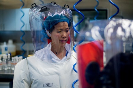 Chinese virologist Shi Zhengli in lab with protective suit.