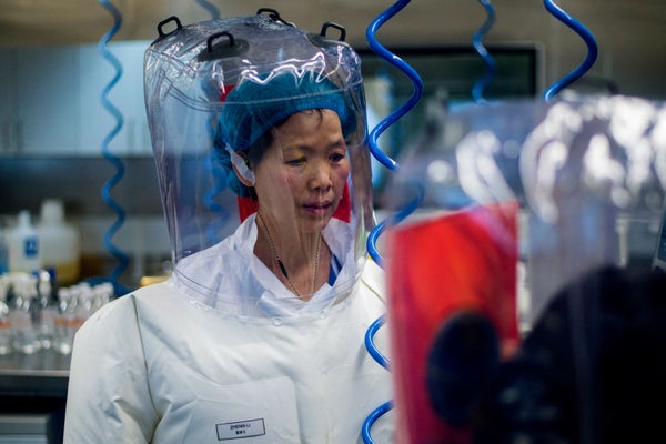 Chinese virologist Shi Zhengli in lab with protective suit.