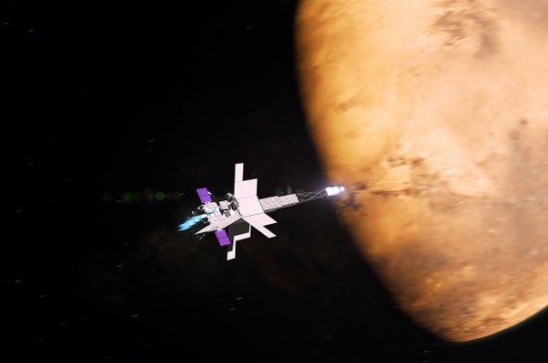 A silvery, angular spacecraft hurtling through space with Mars looming in the background.