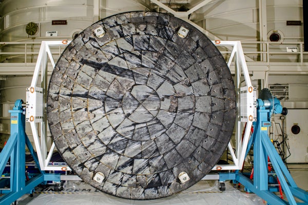 After NASA’s Orion spacecraft was recovered at the conclusion of the Artemis I test flight and transported to NASA’s Kennedy Space Center in Florida, its heat shield was removed from the crew module inside the Operations and Checkout Building and rotated for inspection