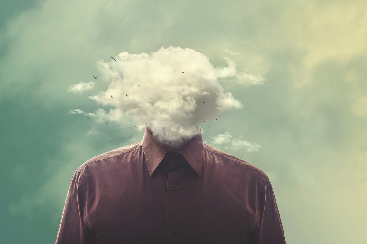 Illustration of stressed man head in a cloud