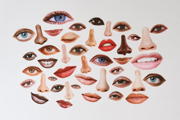 Cut outs of multiple eyes and noses against a gray background