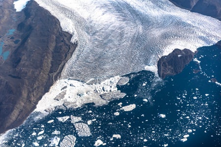 An aerial view of icebergs and ice sheet in the Baffin Bay