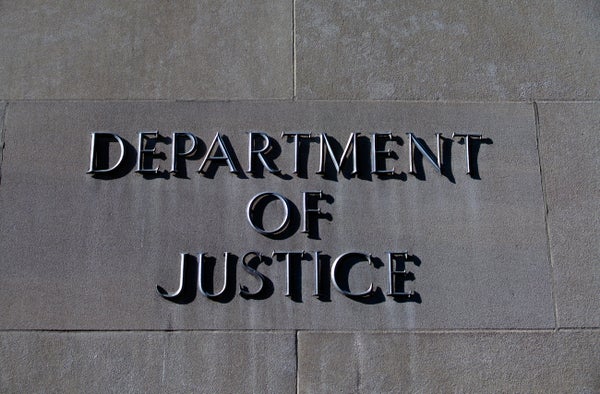 United States Department of Justice Building Sign.