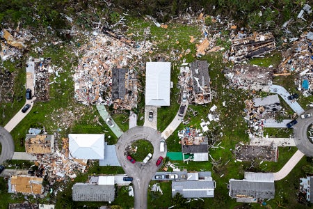Aerial view of destroyed houses in Port St Lucie, Florida, after a tornado hit the area and caused severe damage as Hurricane Milton swept through Florida on October 11, 2024.