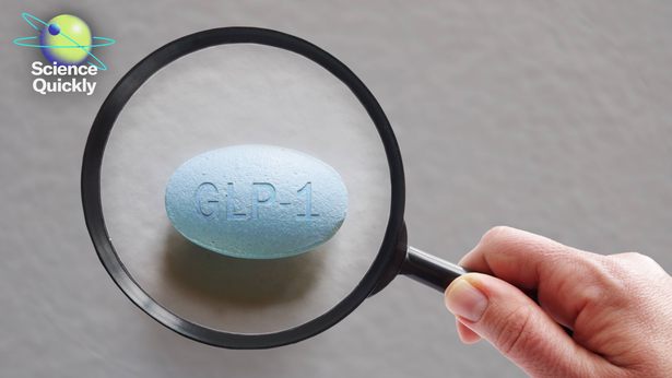 Conceptual image of a GLP-1 pill under a magnifying glass