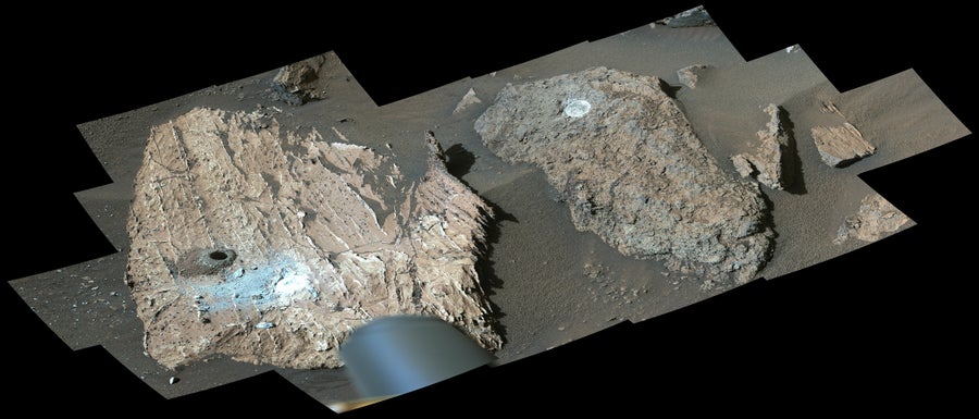 This image from July 23, 2024 shows the “Cheyava Falls” rock (left) with a dark hole where NASA’s Perseverance Mars rover took the “Sapphire Canyon” core sample; the white patch is where the rover abraded the rock to investigate its composition. A rock nicknamed “Steamboat Mountain” (right) also shows an abrasion patch.