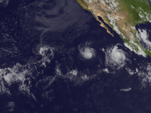 Gif shows two hurricanes spinning in the same direction as they pass each other