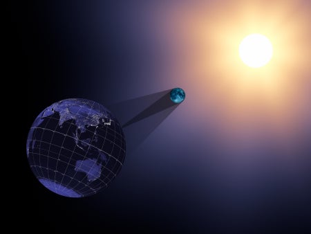 In an illustration of total solar eclipse geometry, the lines on a diagram show the moon's shadow, or umbra, in dark gray and its partial shadow, or penumbra, in light gray