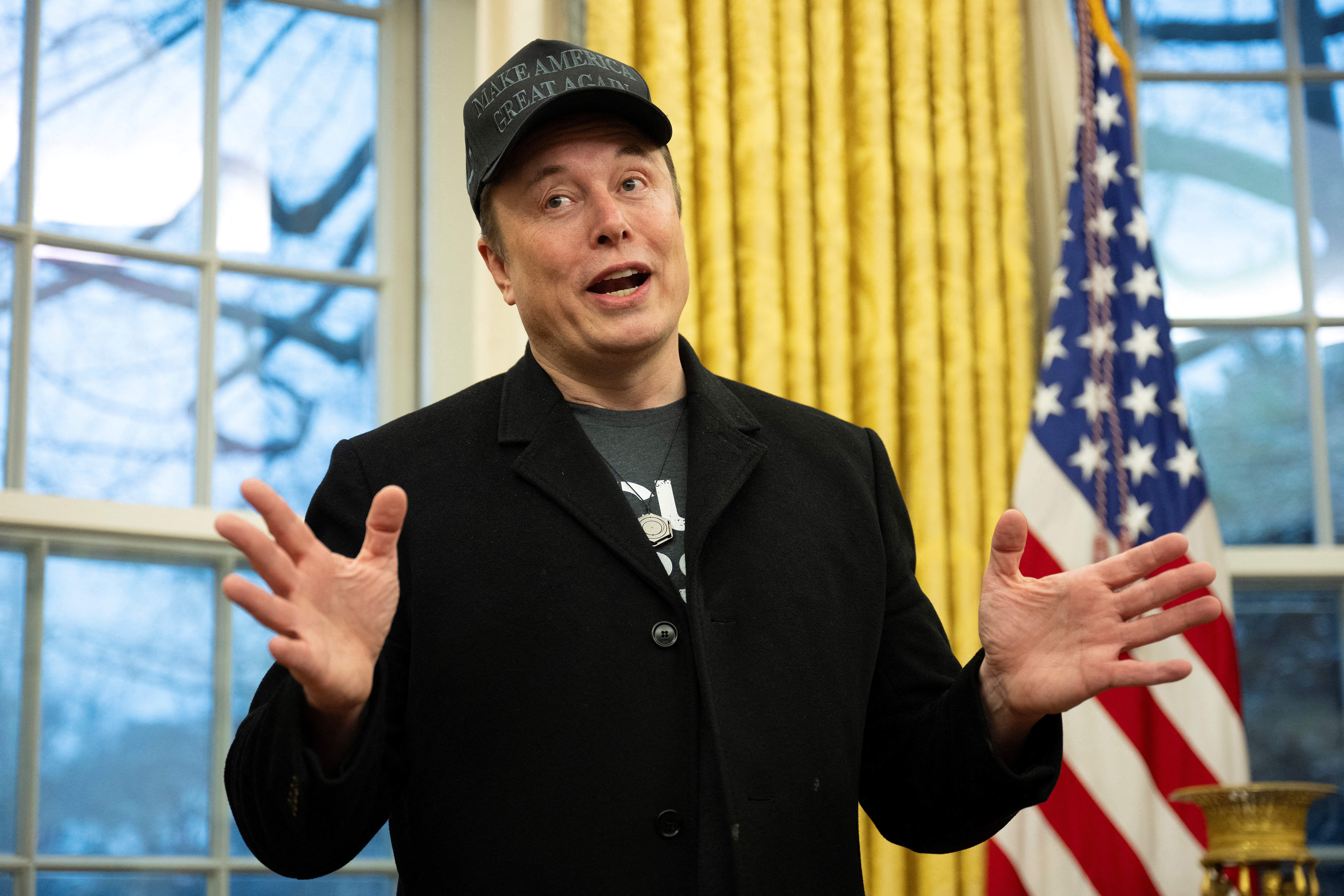 Elon Musk speaks during a Feb. 11 event with President Donald Trump in the Oval Office.
