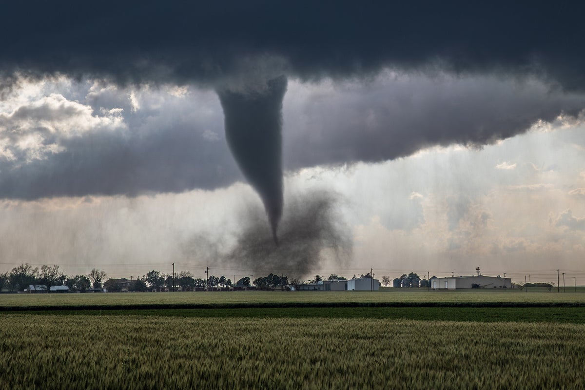 EF2 tornado lofting debris from a home in Lockett, Texas.