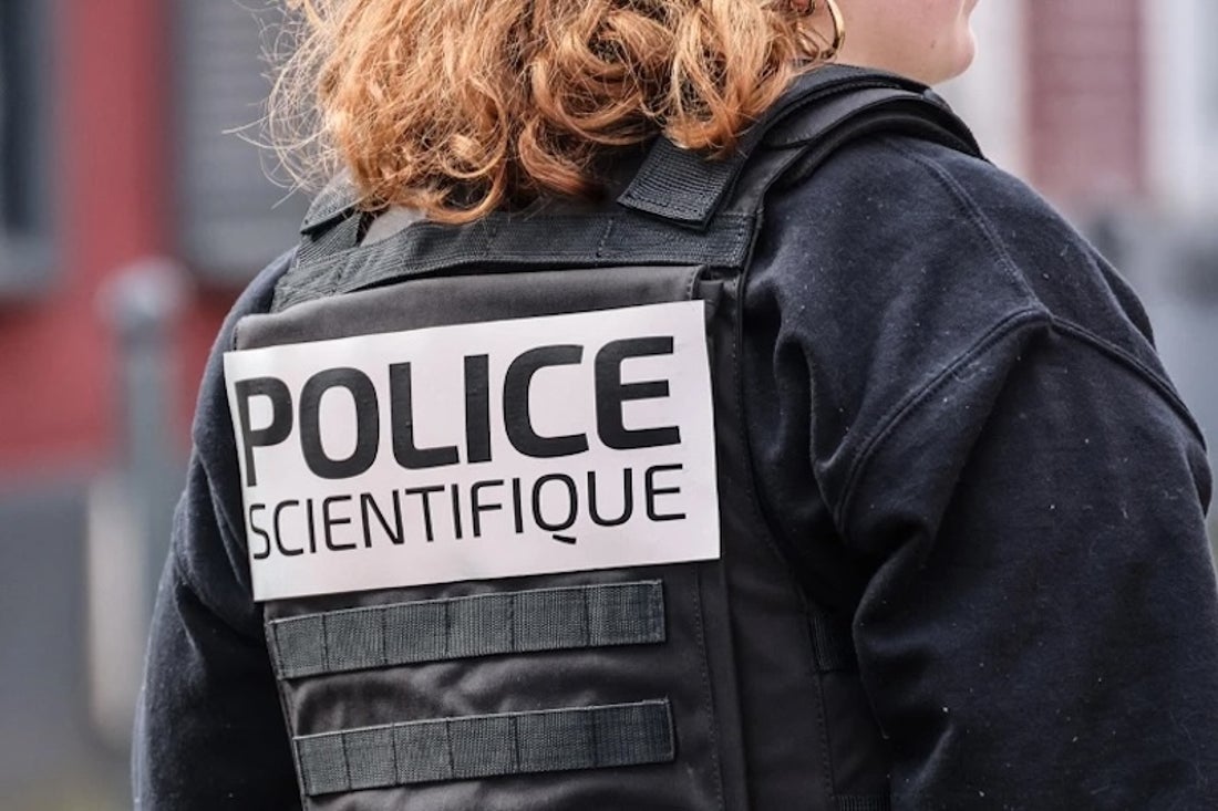 The back of a French police officer.