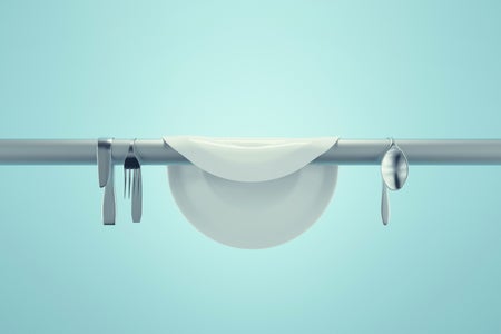 Surreal 3d illustration of a plate and cutlery set draped over a rod, similar to fabric hung to dry