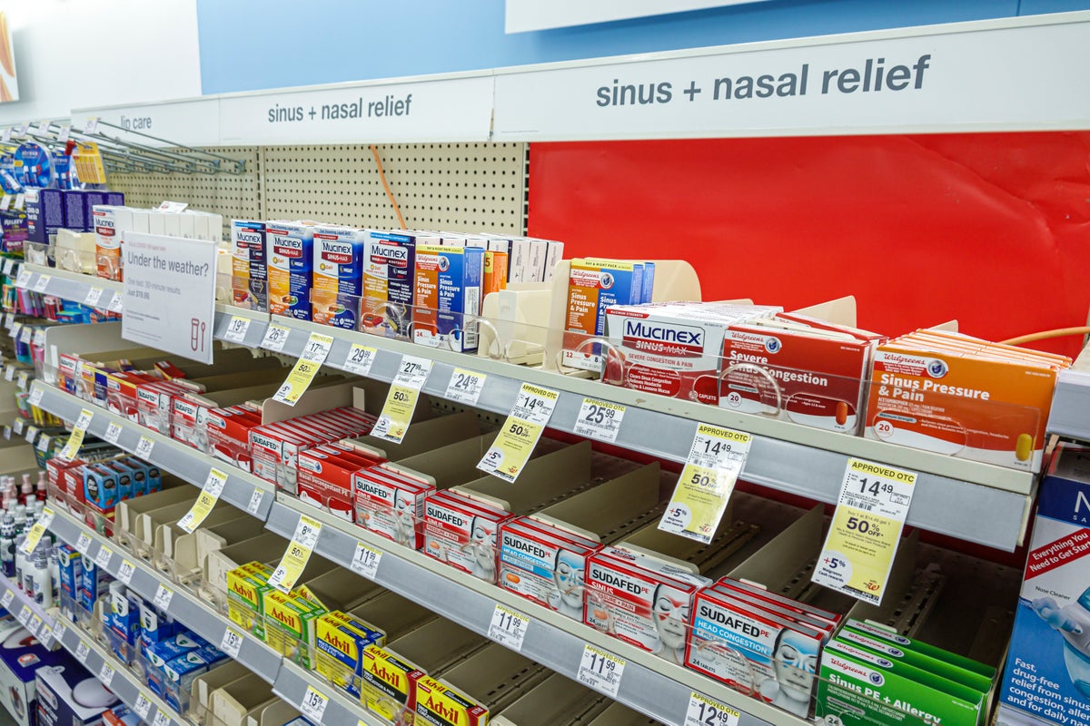 Shelfs at a Miami Beach, Fla., Walgreens pharmacy display over-the-counter cold medicines