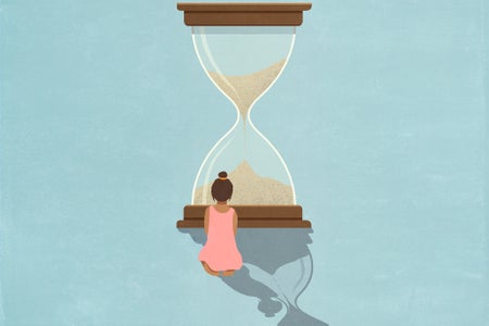 Illustration of a girl sitting in front of and watching sand falling in a large hourglass on a blue background