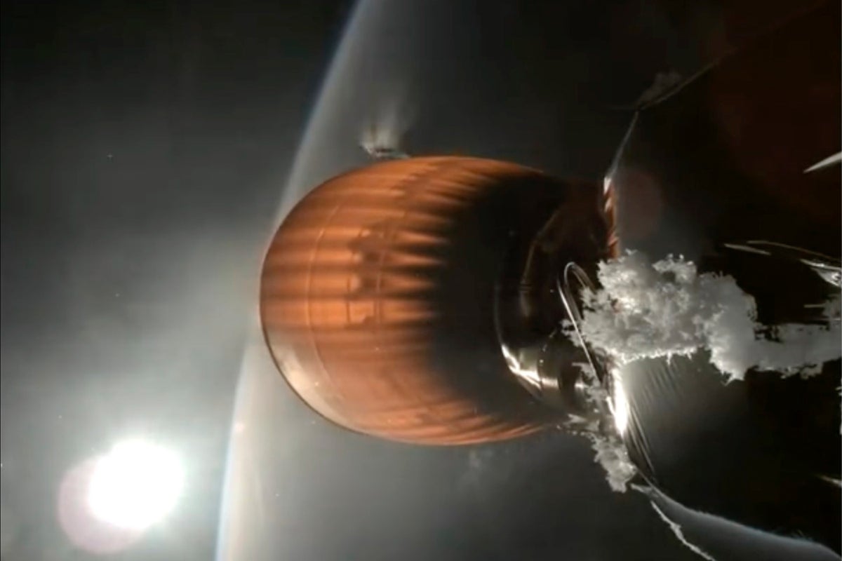 Screenshot from the webcast of a SpaceX Starlink launch on July 11, 2024, showing a buildup of white material on the upper stage of a Falcon 9 rocket.