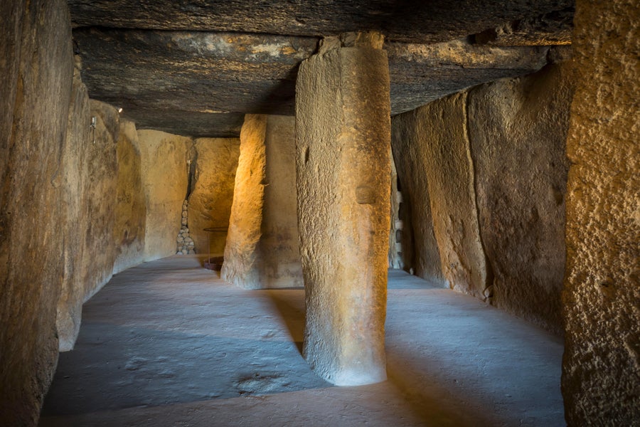 Dolmen of Menga neolithic pillar stones in cave