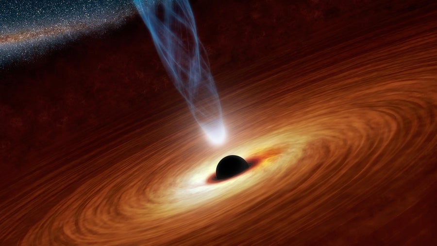 An artist's concept of a feeding supermassive black hole surrounded by a swirling accretion disk and surmounted by an ejected jet of radiation and particles