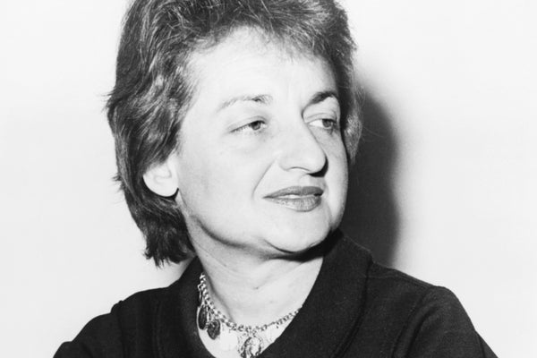 b/w portrat photo of Betty Friedan in black sweater and silver necklace.