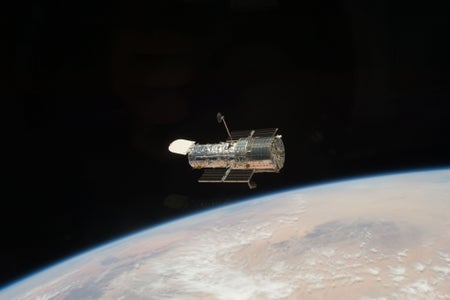 A photograph of the Hubble Space Telescope in low-Earth orbit