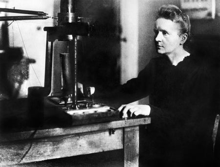 Marie Curie working in a laboratory