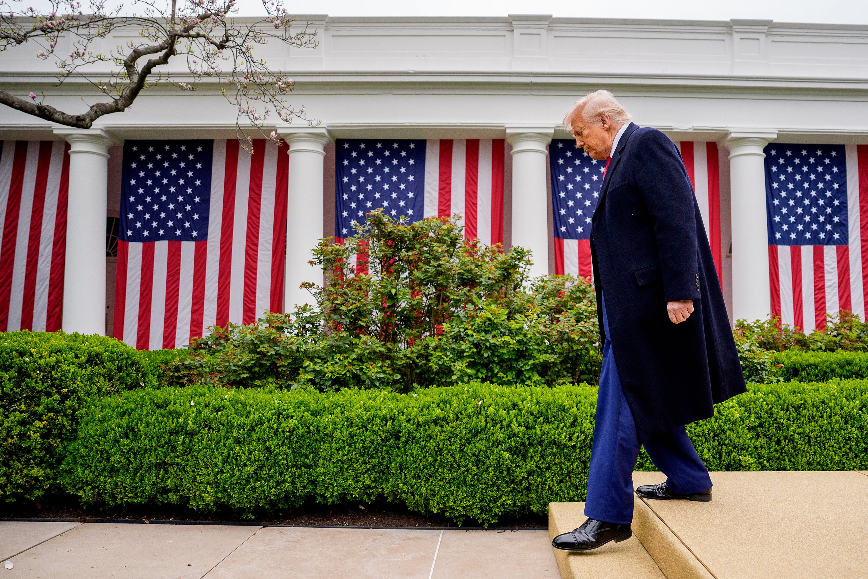 U.S. President Donald Trump is seen taking a step down a set of stairs after a signing ceremony in the Rose Garden at the White House on April 2, 2025 in Washington, DC