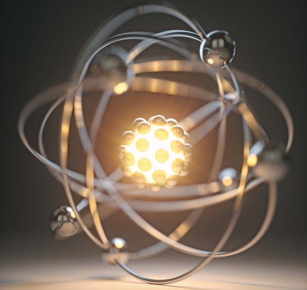 Conceptual illustration of an atom with nucleus glowing