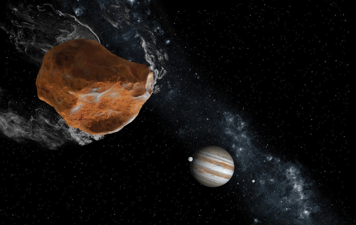 Large orange irregular object in space smaller planets in distance