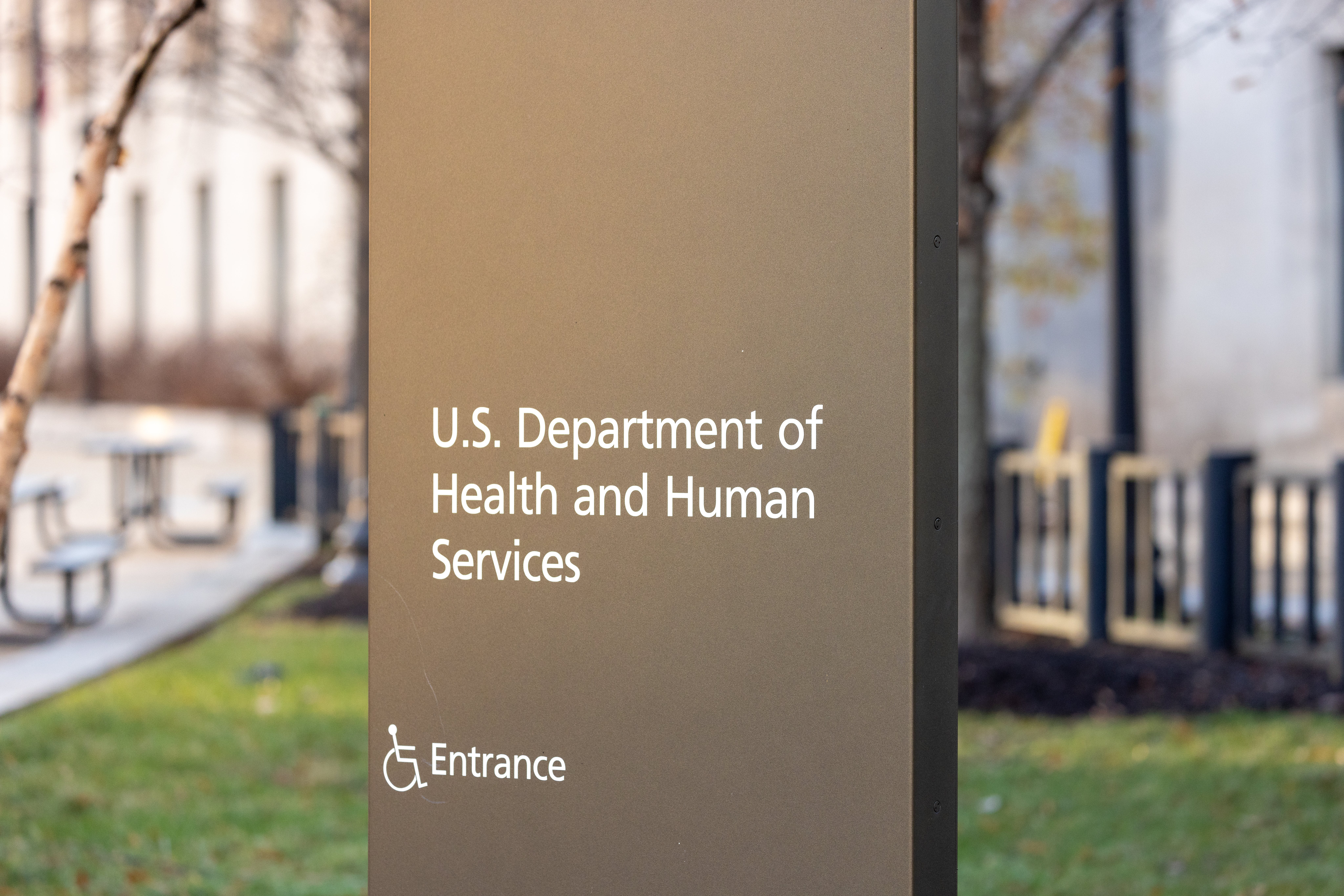 An outdoor sign reading "U.S. Department of Health and Human Services"