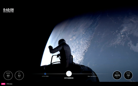 Jared Isaacman outside the Dragon capsule, with Earth in the background